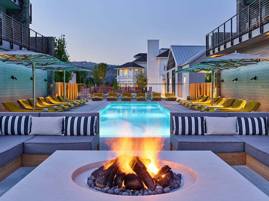 The beautiful exterior pool & firepit at Alila Napa Valley
